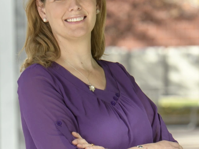 A headshot of Kacey Ernst.