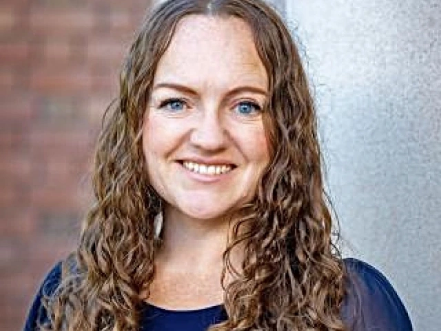 A headshot of Leigh Combrink.