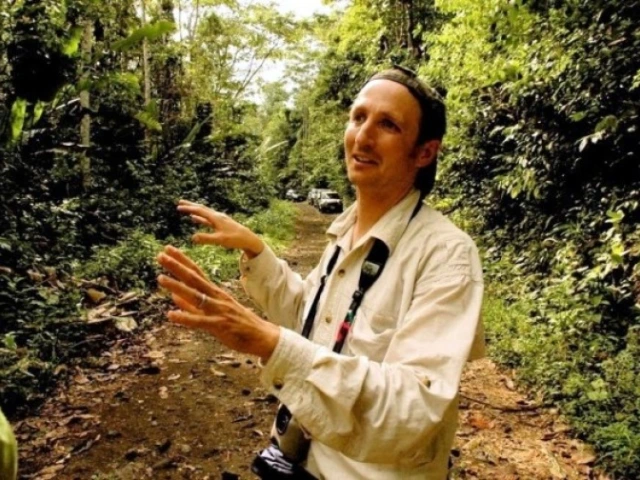A headshot of Brian Enquist.