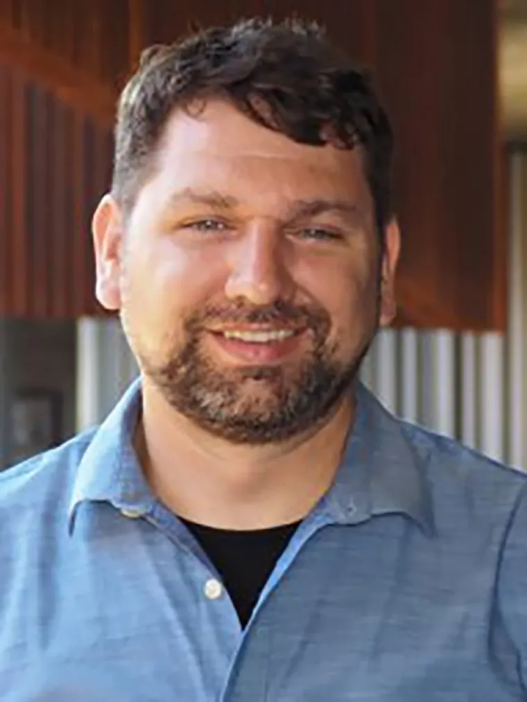 A headshot of Aaron Lien.