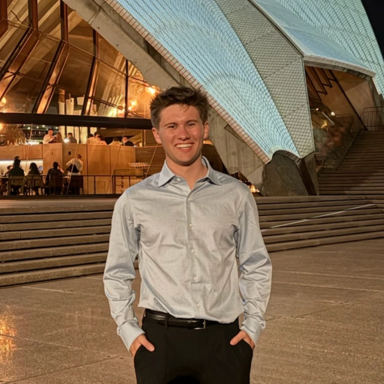 Jacob standing in front of opera house
